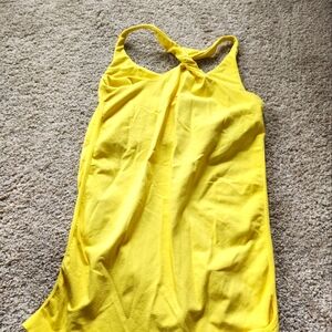 Bebe yellow twist racerback tanktop size M/L  built-in bra.